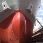 Bow of a large cargo ship in dry dock