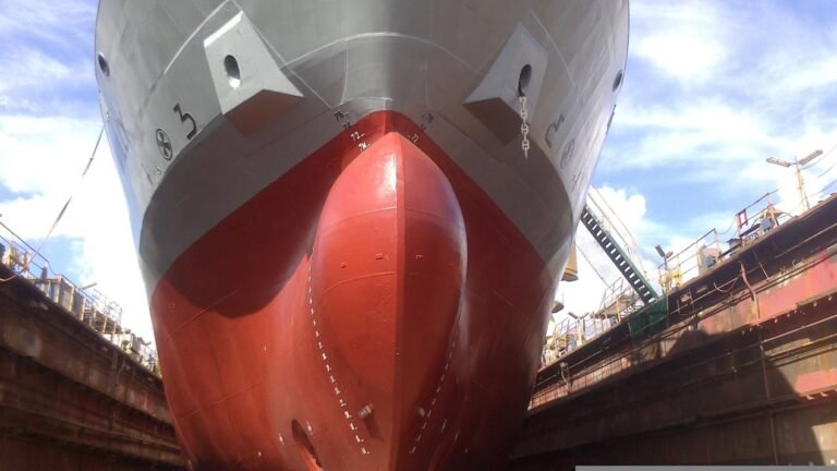 Bow of a large cargo ship in dry dock